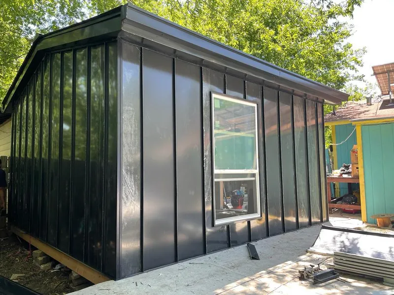 Black standing seam metal wall panels for Roof Inspection in Shawnee