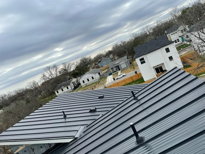 Standing seam metal roof panels with vents for Skylight Repair in Shawnee